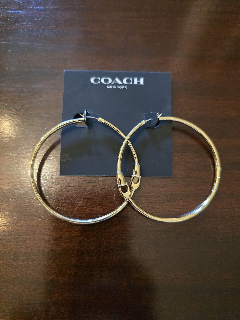 COACH Gold And Black  Hoop Earrings With Signature Coach Initial C